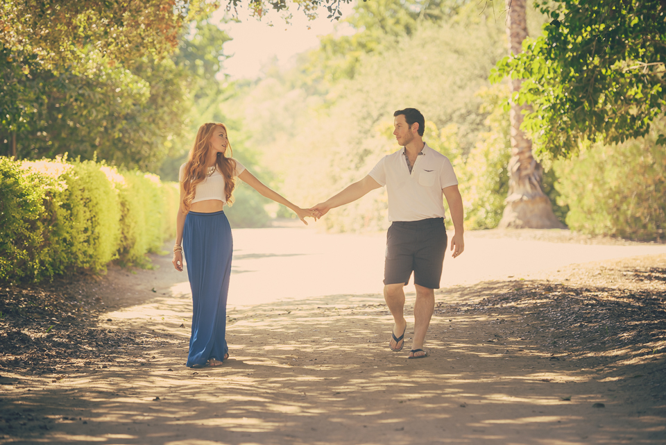 Loving couple walking holding hands