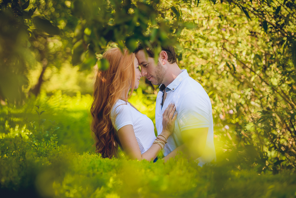 intimate moment between young engaged couple