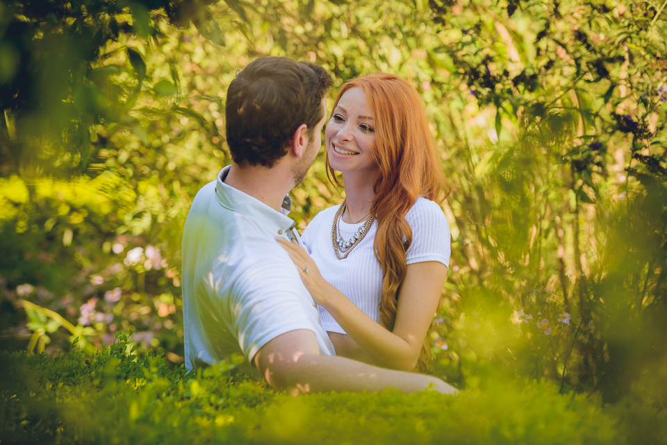 young engaged couple in a park