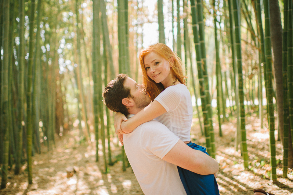 Engaged Couple hugging in a park