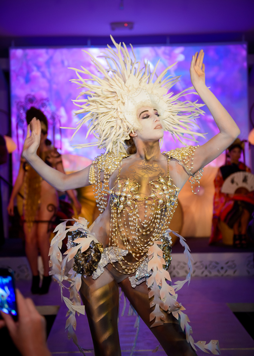 model at unici casa party with elaborate costume design